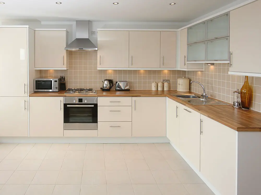 Beige cabinets in modern kitchen