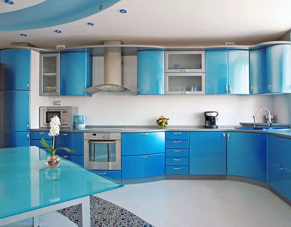 Sky blue kitchen theme with cupboard